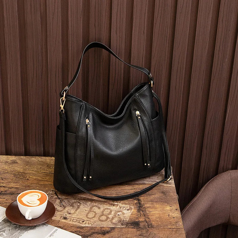 Wendy™ | Skinnveske med frynser