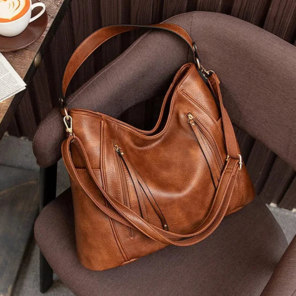 Wendy™ | Skinnveske med frynser